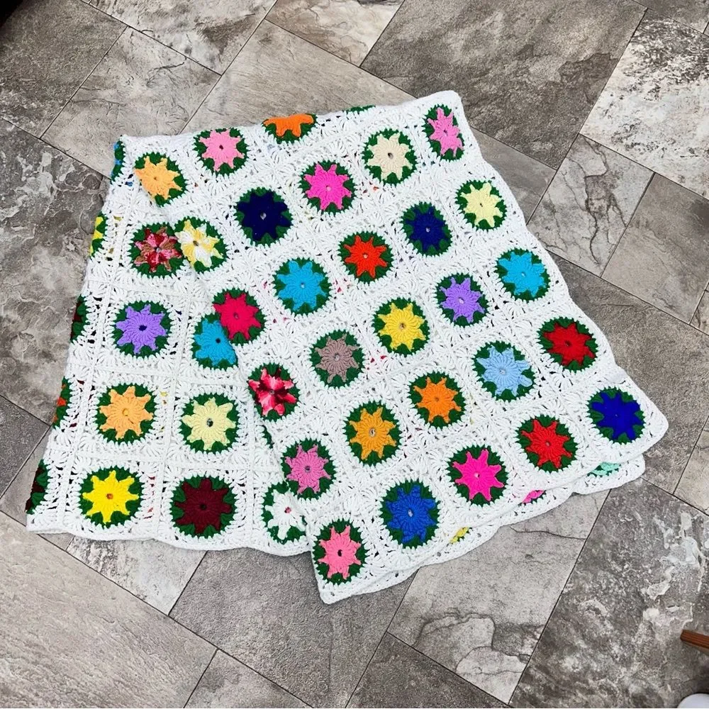 Vintage granny square quilt. the squares are almost like flowers Multicolored